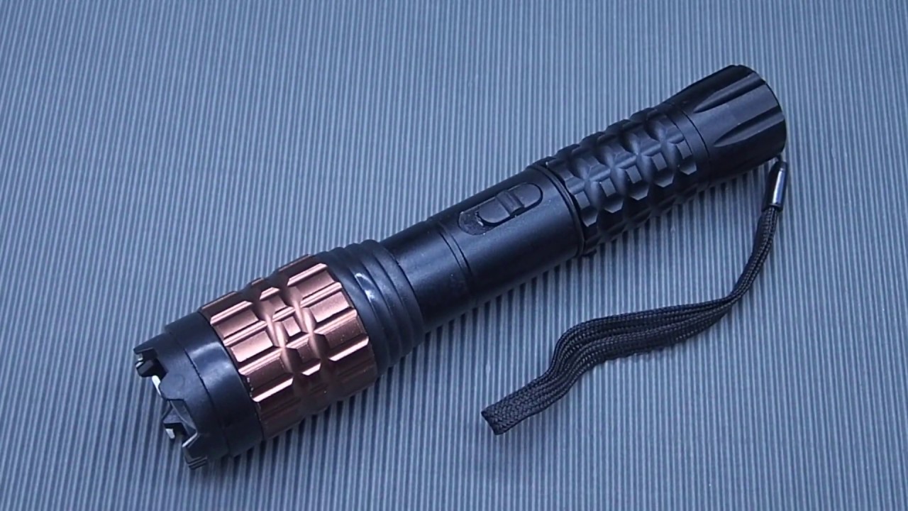 S09 Stun Gun + LED Flashlight + ZOOM + Battery + AC + Car Charger YouTube