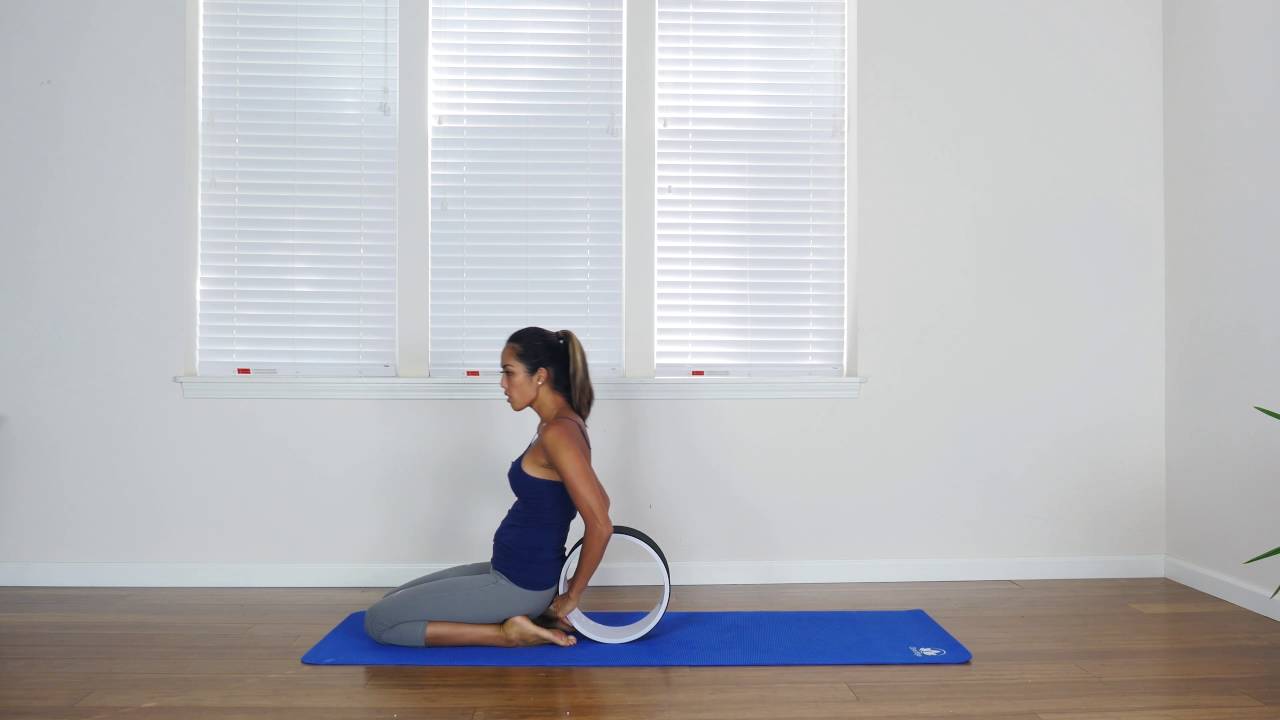 Pigeon Pose ( Kapotasana ) on a 321 STRONG Yoga Wheel YouTube