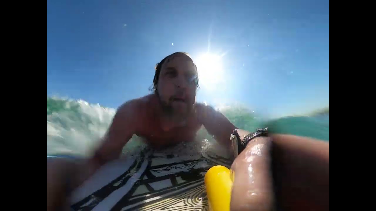 Dallin and Madeline on whale catch wave