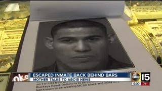 Escaped inmate back behind bars