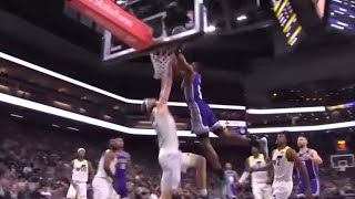 De’Aaron Fox Two Hand Poster Dunk On Kelly Olynyk…..