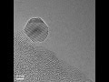 Hrtem of a platinum nanoparticle on a polystyrene sphere