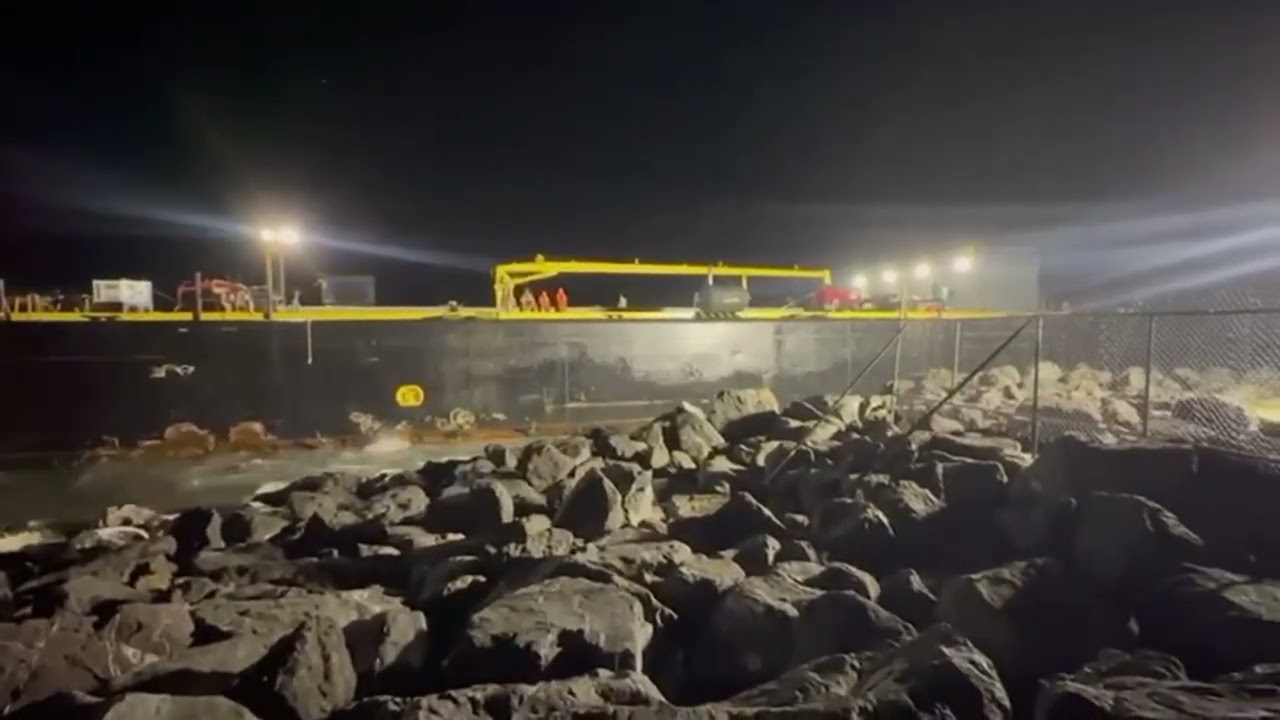 Grounded barge Defiant refloated