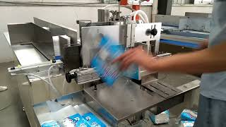 Semi automatic napkin paper facial tissue hand towel plastic bag packing machine
