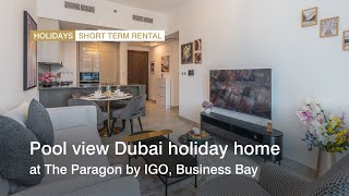 Pool view Dubai holiday home at The Paragon by IGO, Business Bay | haus &amp; haus Holiday Homes