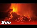 Red-hot lava spews from volcano on Spanish island La Palma