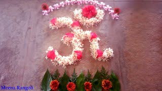 Om with Parijahta flowers - flower kolam - diwali rangoli - festival rangoli