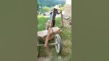 The principle of lever is skillfully used to carry a large stone