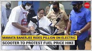 WATCH | Mamata Banerjee rides pillion on electric scooter to protest fuel price hike