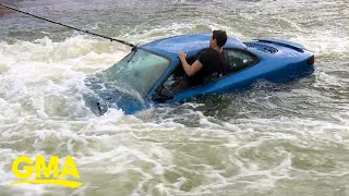 How to escape from car trapped in flood waters l GMA