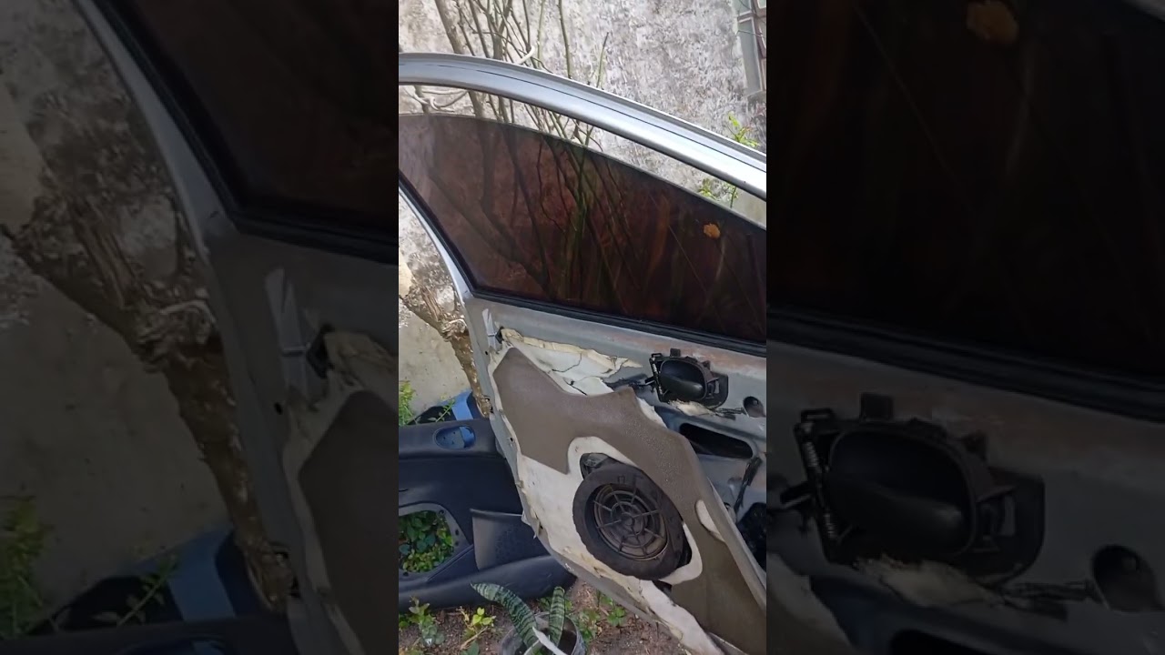 PEUGEOT 206 COM BARULHO DENTRO DA PORTA.