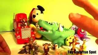 12 Surprise Eggs - Sily Faces - Olaf Daisy Duck Pluto Peguins And More