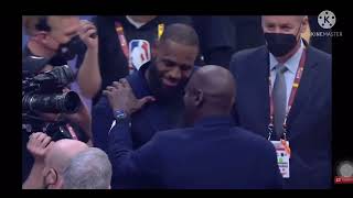 Michael Jordan and Lebron James Embrace Each Other