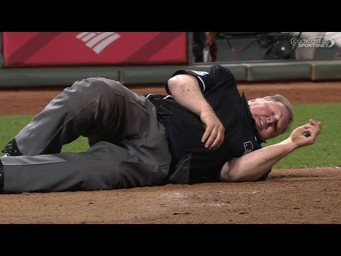 laa@sf:-umpire-bill-miller-takes-a-pitch-off-his-knee