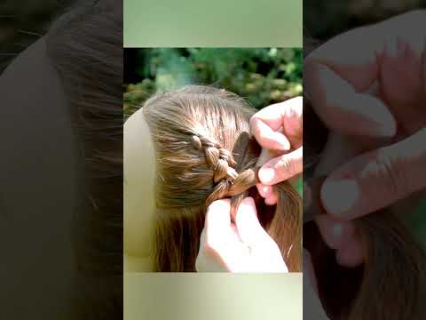 Video: Cómo hacer una trenza holandesa Mohawk: 9 pasos (con imágenes)