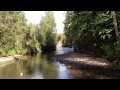 ATV crossing river Ushma, Northern Urals, Russia