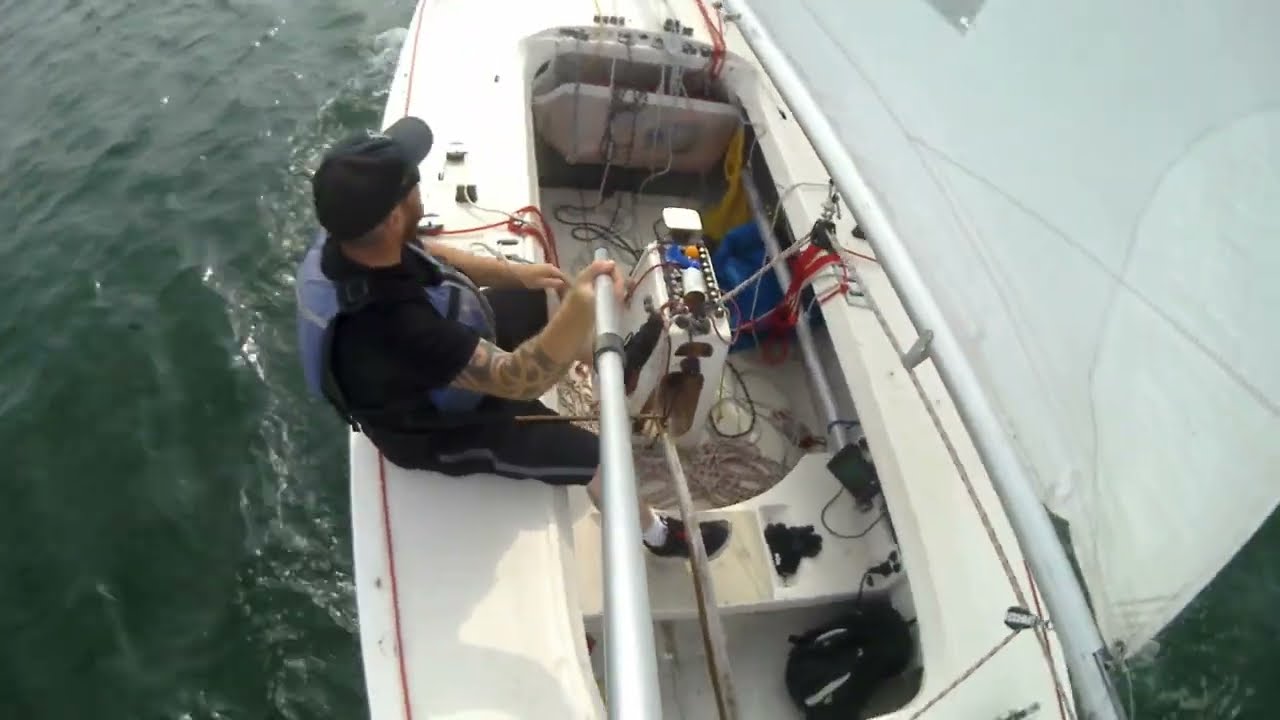 Solo sailing the Etchells with asymetrical spinnaker on furler