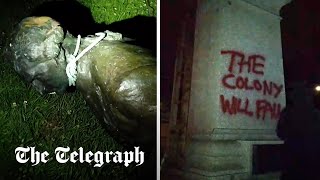 video: Captain Cook statue sawn off at the ankles in Australia Day anti-colonial protests