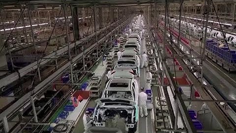 Chinese factory output, retail sales slow sharply