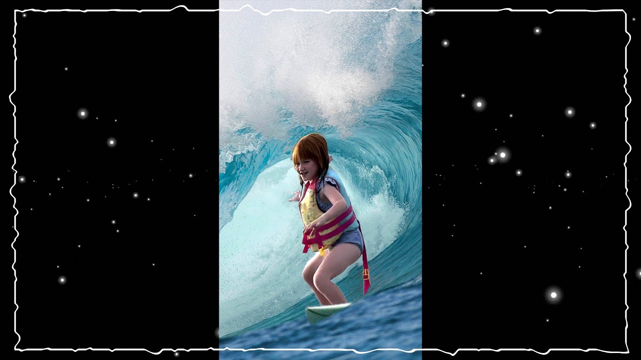 ADLEY can SURF! Learning to ride waves on a paddle board at Pirate Island! Family beach day 