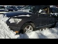 Some guy piled snow in front of a vw touareg