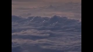 UFOs Videotaped over South China Seas
South China Sea - 11-24-21
South China sea, 9 lights visible in video, then it becomes 12 lights in formation.
Closest object disappears, then 3 more objects reappear on outside of formation.
Filmed at 39,000ft over the South China Sea, lights all then slowly vanish.
original source: www.mufon.com
video edited by www.ufocasebook.com UFOs Videotaped over South China Seas