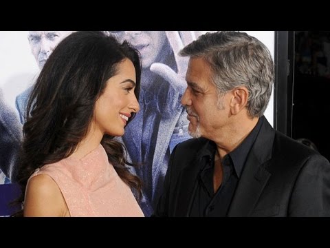 George Clooney and Amal Share Sweet Kiss on the Red Carpet!