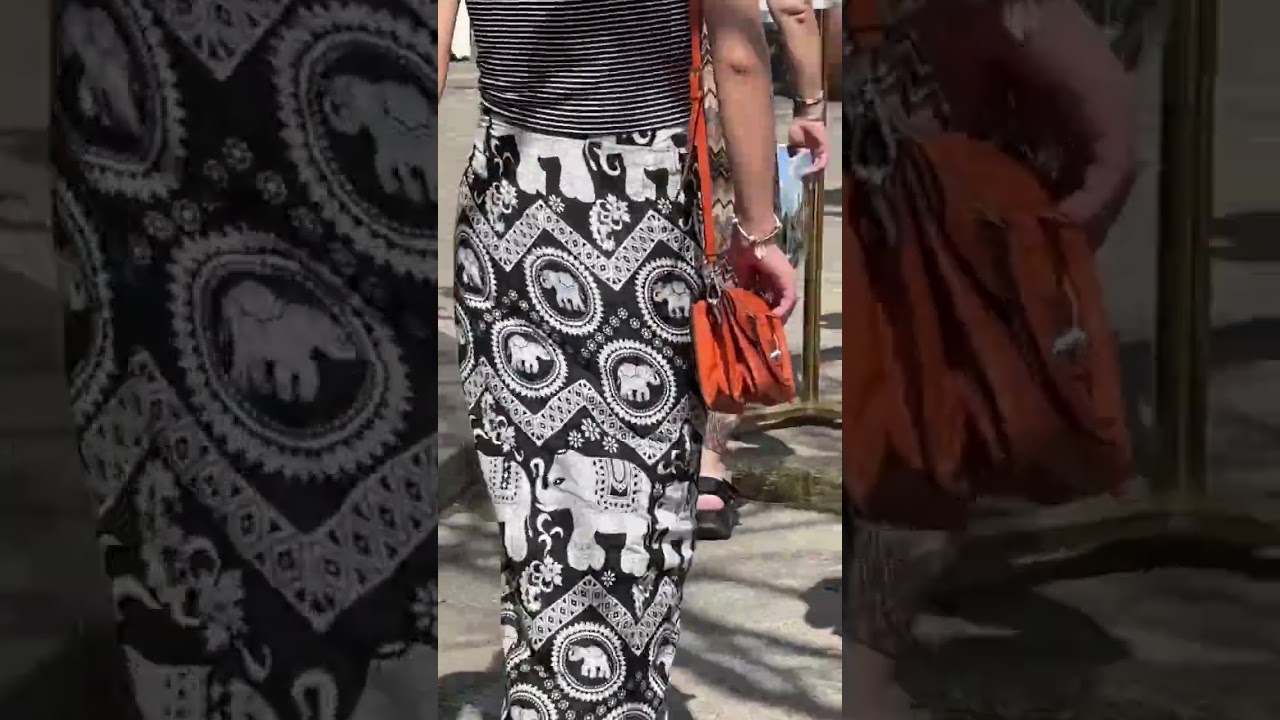 Thai local likes tourist's authentic elephant pants and love for