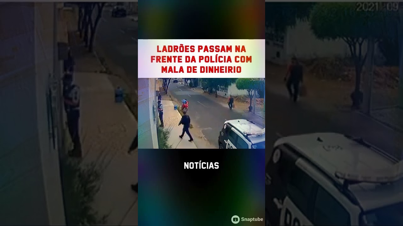 Na frente da podia com malas de dinheiro