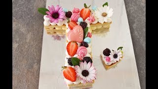 pastel 1000 hojas en forma de letra macarrones suspiros
