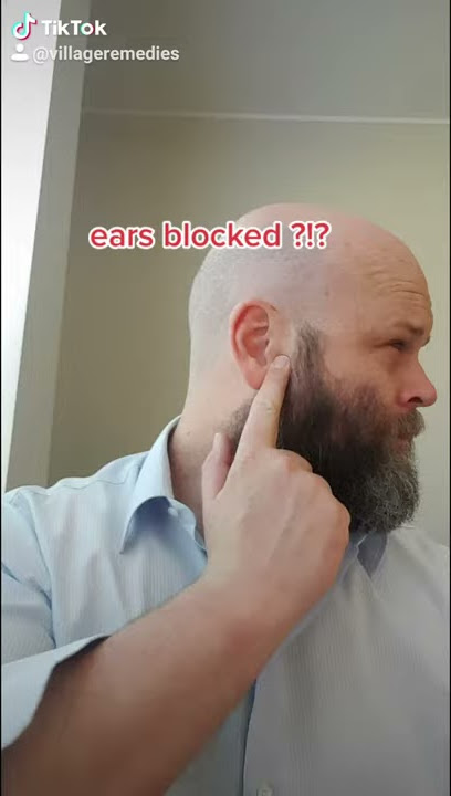 Acupressure massage for blocked ears