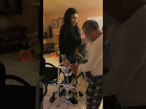 Paralyzed teen stands