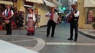 Greek People singing on the street in Corfu.