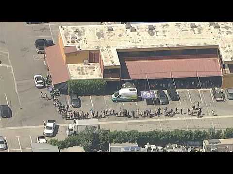 Residents line up for air purifiers; chief hopes Boyle Heights fire is out by midweek