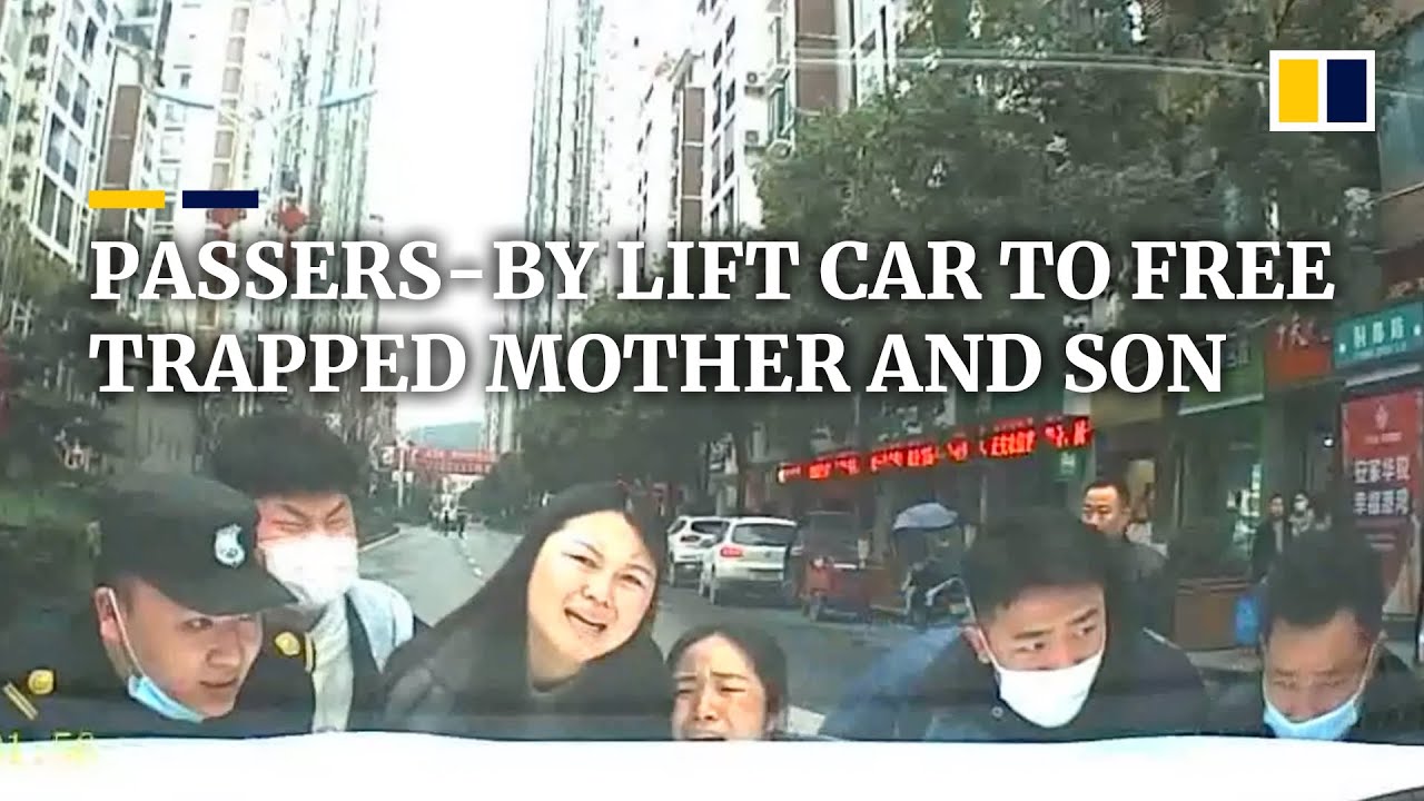 Passers-by in China lift car to free trapped mother and son - YouTube