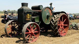 Different Cross Motor Tractors Plowing the field