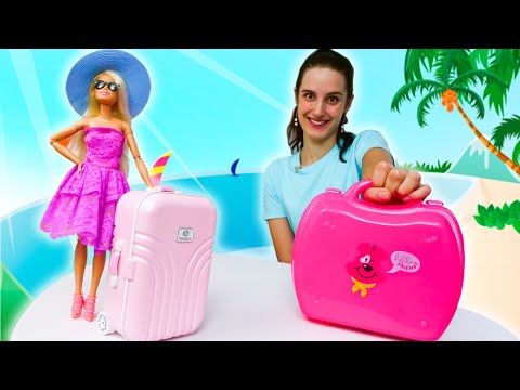 Barbie et Ken vont à la plage. Faisons la valise. Vidéo en français pour les filles.