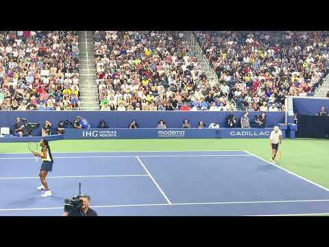 John McEnroe serves