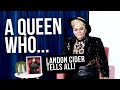 Landon cider on a queen who
