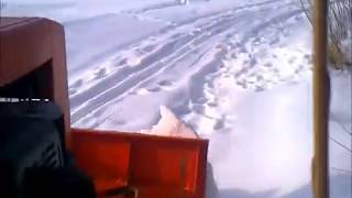 t012 with (honda gx 390 clone engine) self made snow plow in action.