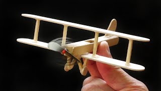 Make a DIY Toy Plane from lollipop or Popsicle sticks. Fun craft idea you can do with kids. Use a glue gun to stick it together, and ...