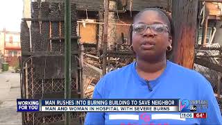 Man rushes into burning building to save neighbor