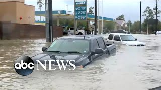 Harvey victims rescued from cars on flooded roads