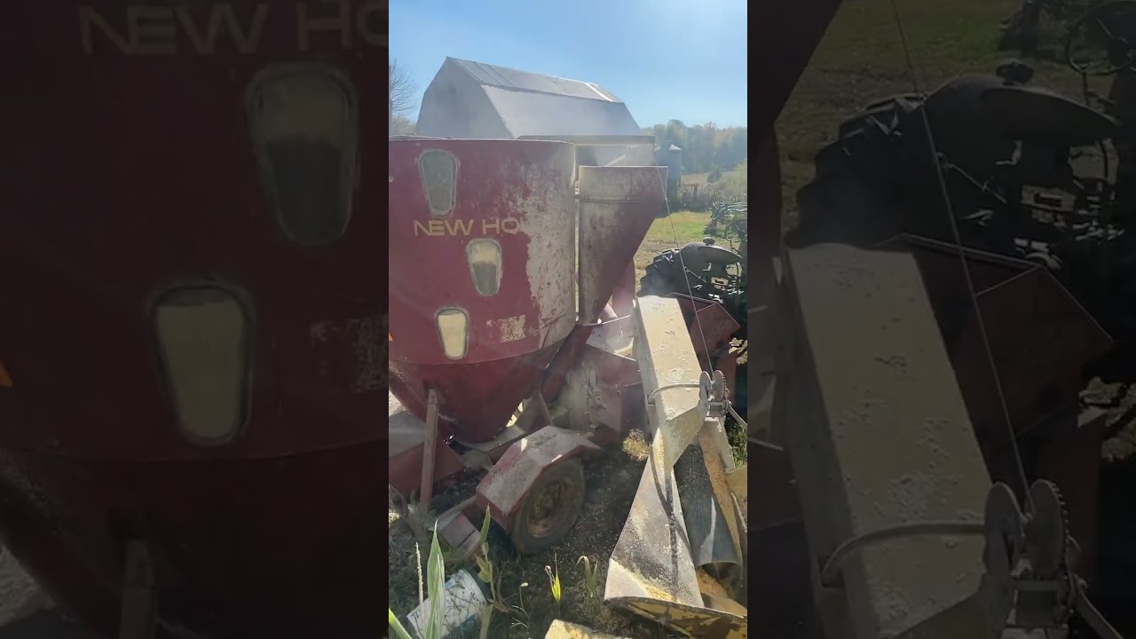 Grinder Mixer Action. New Holland 352 getting it done!