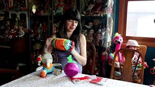 A Trio Of Skip Hop Baby Toys Elephants, Beets And Accordions