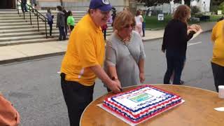 Clinton Olde Home Day cutting the cake