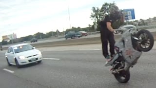 Motorcycle vs cops epic escape biker rides wheelie while running from
the caught on camera street bike police chase 2016. video of e...