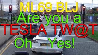 Tesla Ml69 Blj. Self Entitled Red Light Jumping Imbecile. No Rule For This Fool Manchesters Idiot.