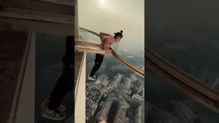 Daniel Lazians Doing Dips At 40 Storie Building