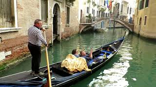 Venice Italy  - Beautiful canals scenery, Grand Canal, Rialto Bridge and gondola boat rides